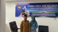 PARTISIPATIF: Lurah Melayu Aditya Rakhman bersama Ketua TP-PKK Melayu menghadiri Lomba Desa Kelurahan. (Linikaltim.id)